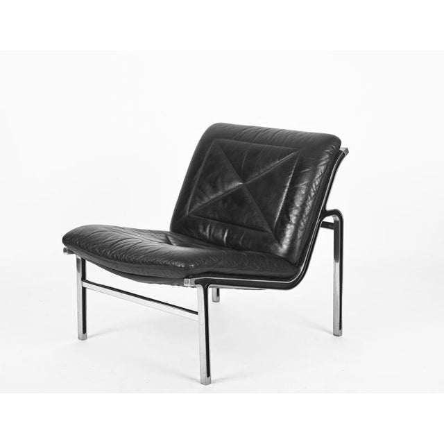 Fabulous pair of "Aluline" lounge chairs made black leather and in a beautiful combination of chromed and black enameled...