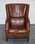 Antiques of London A stylish vintage brown heritage leather reading lounge armchair, designed with a relaxed, club-style...