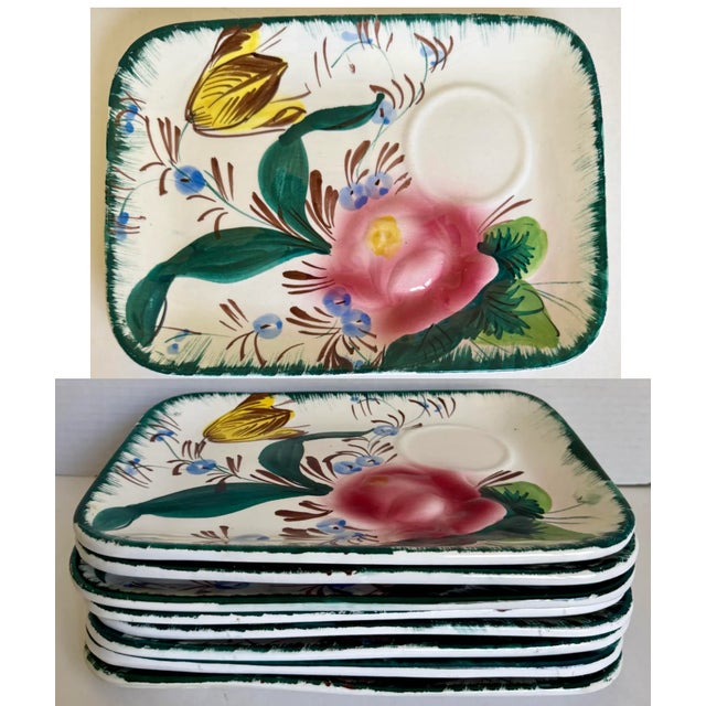 This charming set of eight hand-painted Italian snack plates dates to the mid-20th century and features a whimsical floral...