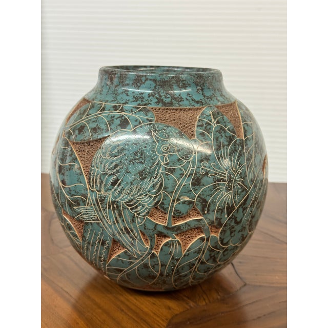 Design Plus Gallery presents a Dimensionally Etched Vessel with Birds in a Nicaraguan Style. The tone of the vase has a...