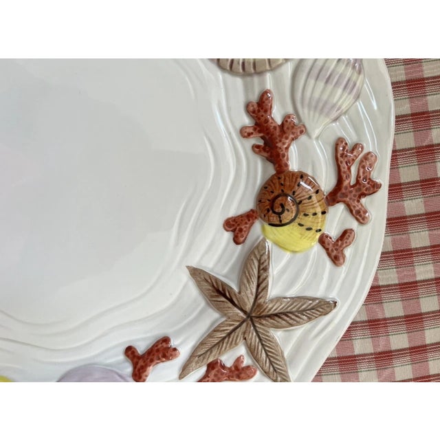 Add a splash of coastal elegance to your table with this stunning vintage Fitz & Floyd “Coral Shells” platter. Beautifully...