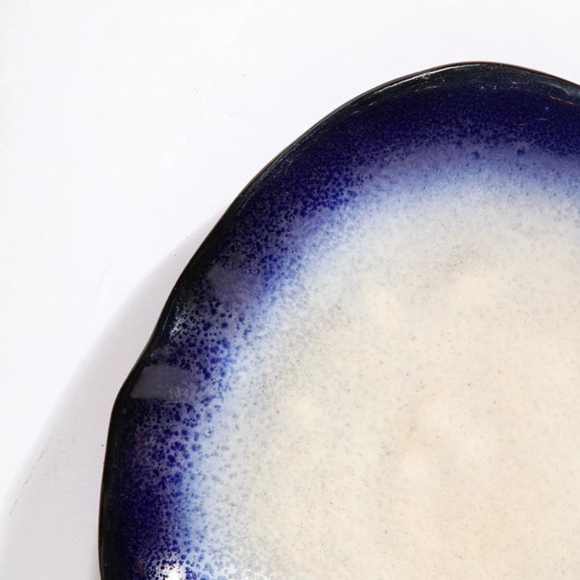 This lovely Oyster form Ceramic Plate signed Pol Chambost originates from France, Circa 1960. Depicting an abstracted...