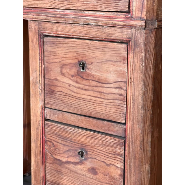 Circa 1890 Spanish Pine Campaign Desk with inset brass pulls constructed in three sections - the top section with three...