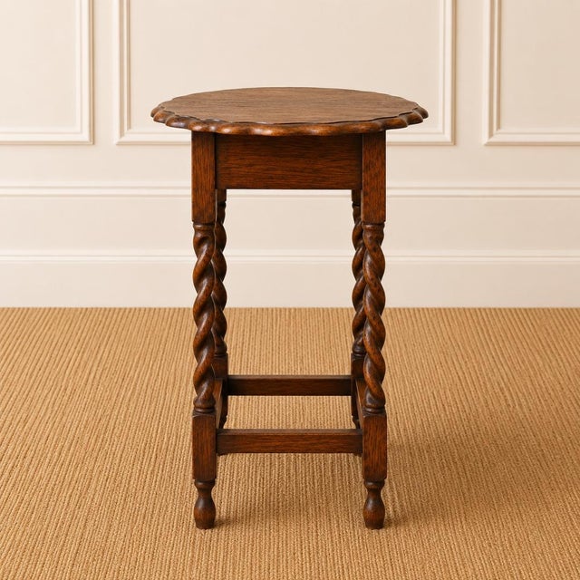 A masterwork of Victorian craftsmanship, this antique English oak side table commands attention through its expertly...