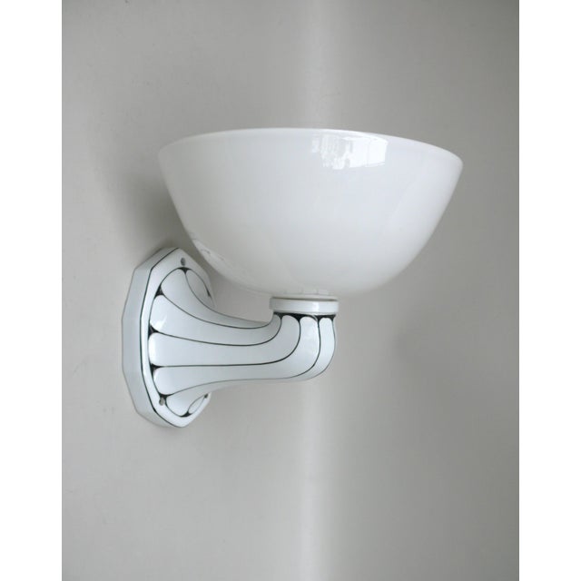 An extraordinary and extremely rare wall sconce, manufactured by Brunnquell in Germany during the Art Nouveau period. It...