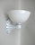 An extraordinary and extremely rare wall sconce, manufactured by Brunnquell in Germany during the Art Nouveau period. It...