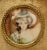 French picture is ivory of a beautiful girl in a white hat. It is signed bun can not make it out. Bronze jewelry frame...