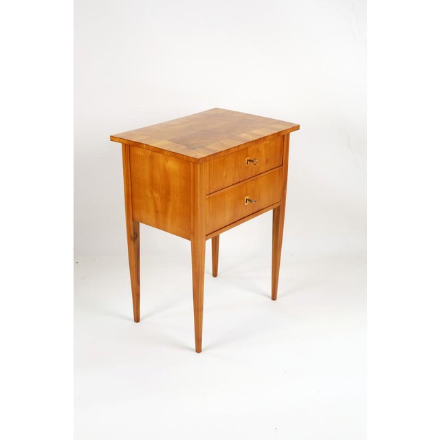 A very nice little table with a hinged lid, divided inside, a box with 3 small drawers on the right, and another drawer...