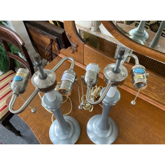 Late 20th century pair of Stiffel lamps. metal base. Double socket, chain pulls. Would work best with a short wide shade...