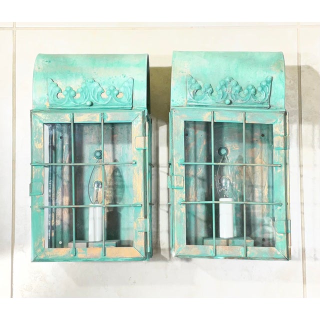 pair of artistic funky hand-crafted solid copper wall lanterns. Created by a dedicated mixed-media artist, these sconces...
