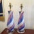 Designed by Dino Martens, these soft pastel swirled lamps are on thick Lucite bases, all original. Note: Shown and sold...