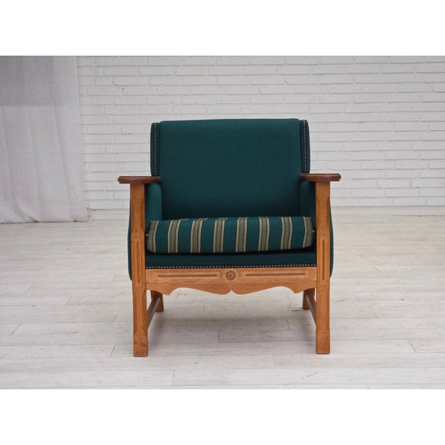 1970s, Danish armchair. Original turquoise green furniture wool, solid oak wood. Original good condition: no smells, no...