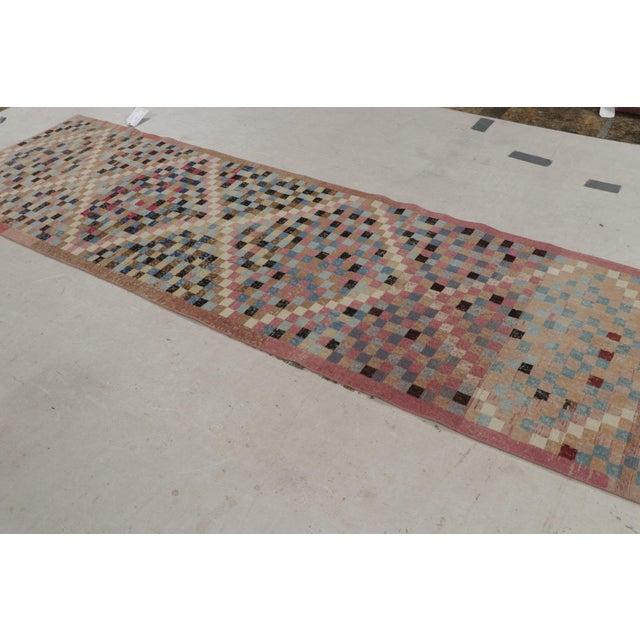 Hand knotted in Turkey originating between 1960-1970, this vintage midcentury runner is the latest to join Rug & Kilim’s...