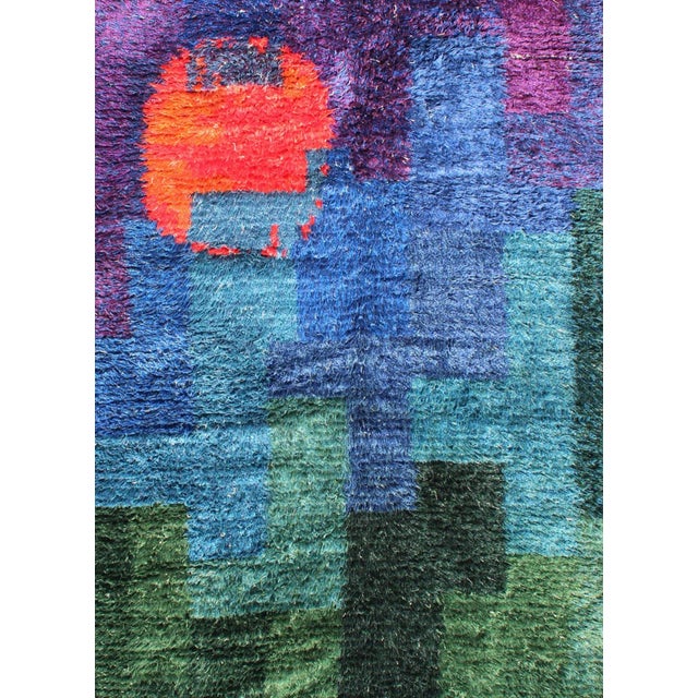 Measures: 4'10'' x 7'2''. The richly opulent colors and unusual design of this Scandinavian carpet transport you to Mid-...