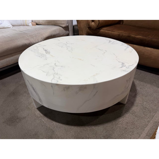 A study in modern minimalism with a luxe edge, the Mirella Coffee Table by Sunpan brings sculptural presence and refined...