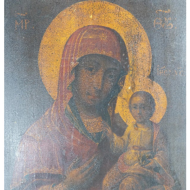 We are selling this decorative Russian or Greek orthodox Religious Icon. This Christian Icon features early style Madonna...