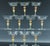 Vintage Murano Glass Champagne Coupes, Peach and Gold-Leaf Ribbed Stems, Set of Ten Mid-to-Late 20th Century This set of...