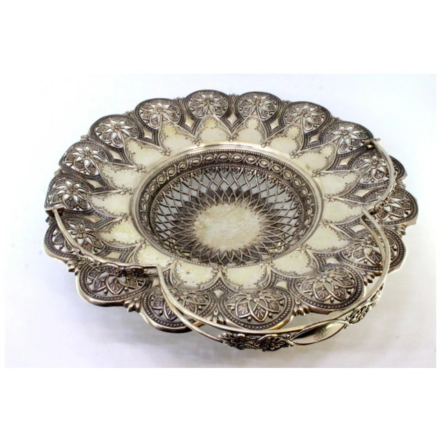 Silver Fruit Bowl with Cutouts, in Very Good conditions. Designed 1890 to 1919 This piece has an attribution mark, I am...