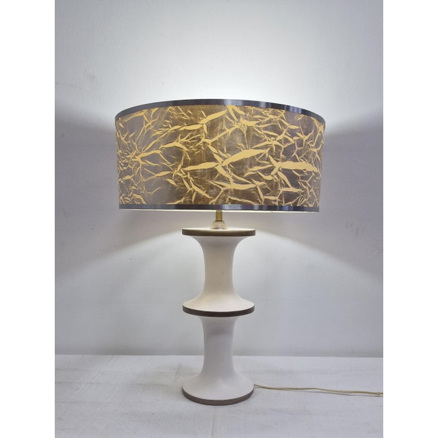 Splendid table lamp from the 80s, Italian, in perfect working order. The measurements of the base are: height 53 cm,...