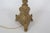 Brass floor lamp - originally it was a candlestick. There are religious motifs on the candlestick. The lamp is very nicely...