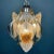 Mid-Century amber Murano chandelier Mazzega by Toni Zuccheri was made in Italy in the 1970s. Although the lamp is not...
