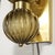 This elegant pair of modernist hand-blown Murano glass sconces embodies the rich tradition of Venetian glassmaking with a...