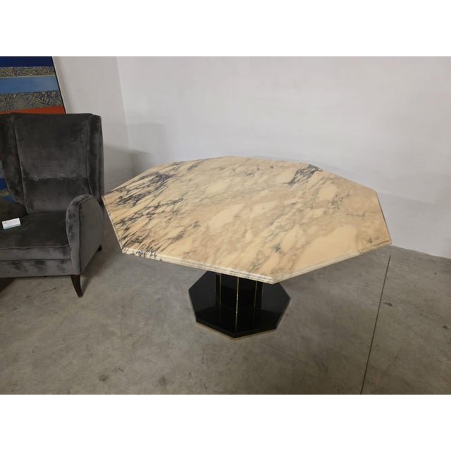 Octagonal marble table. Elegant French-made table with geometric shapes, circa 1970s, in Art Deco style. Octagonal...