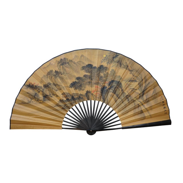 A very large and impressive 20th-century Chinese hand-painted paper-folding wall-hanging fan. Wooden bamboo sticks and...
