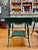 Pair of antique wicker tables from famed American manufacturer, Heywood Wakefield. In emerald green. From the late 19th...