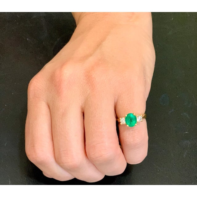 2010s Oval Emerald and Diamond Three-Stone Ring 14 Karat Yellow Gold For Sale - Image 5 of 18