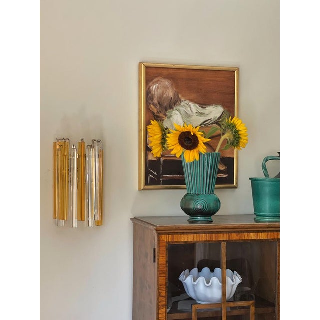 Set of 3 three Eclectic Colorful Murano Wall Lamps, each lamp consisting of nine crystal prisms, five in amber tone and...