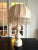 Beautiful lamp of the 70s in wood turned beige lacquered and its original lampshade (tears photographed), edited by the...