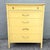 This vintage coastal highboy dresser by Thomasville brings sunny Palm Beach character to a practical vertical silhouette....