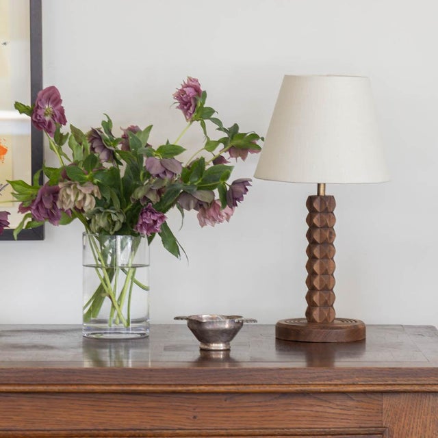 Lovely carved wood table lamp from France, 1940s by Charles Dudouyt. Beautiful carved chevron design with original dark...