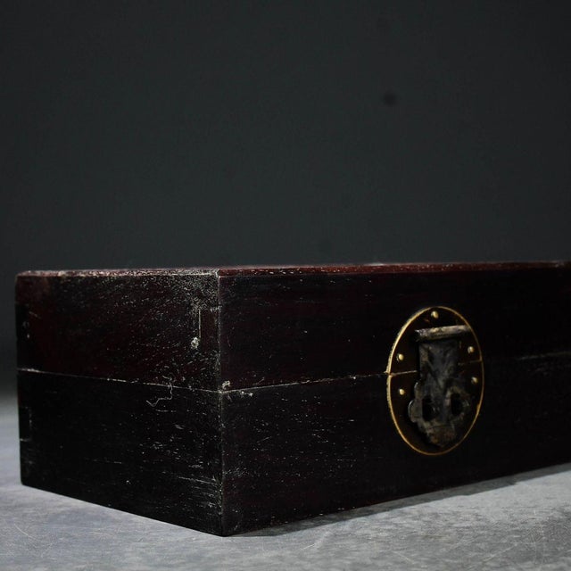 This is an exceptionally elegant vintage Chinese jewelry box or keepsake chest. It features a striking contrast between a...