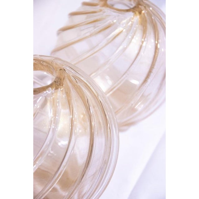 Pair of Murano glass balls is an original decorative object realized in the half of the XX century in the style of...