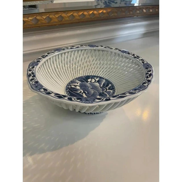 Offered is a vintage blue and white asian theme decorative bowl. This piece is marked on the underside and believed to be...