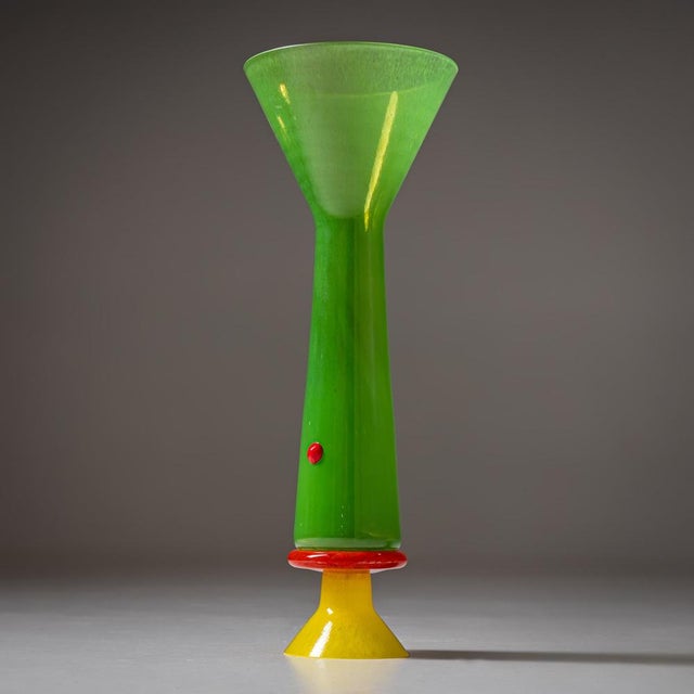 Striking studio vase from the B.A.G. (Barovier Art Glass) series, Murano, Italy, late 20th century. Crafted in vivid green...