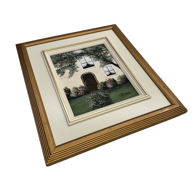 A charming vintage original painting signed “Carmen”, depicting the façade of a country house surrounded by lush greenery...