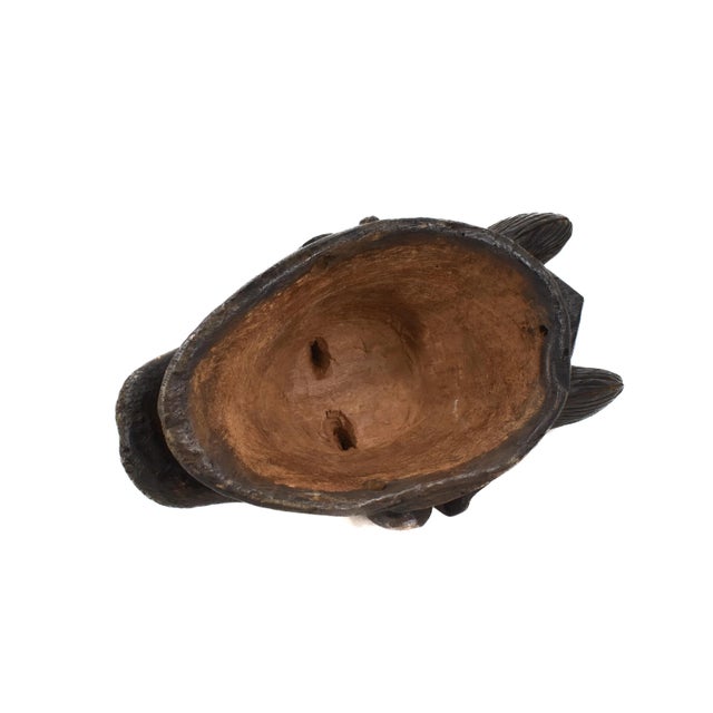 This mask is used by various tribes in Gabon. This one comes from the Punu. Mmwo Spirit Maiden Mask portrays a beautiful...