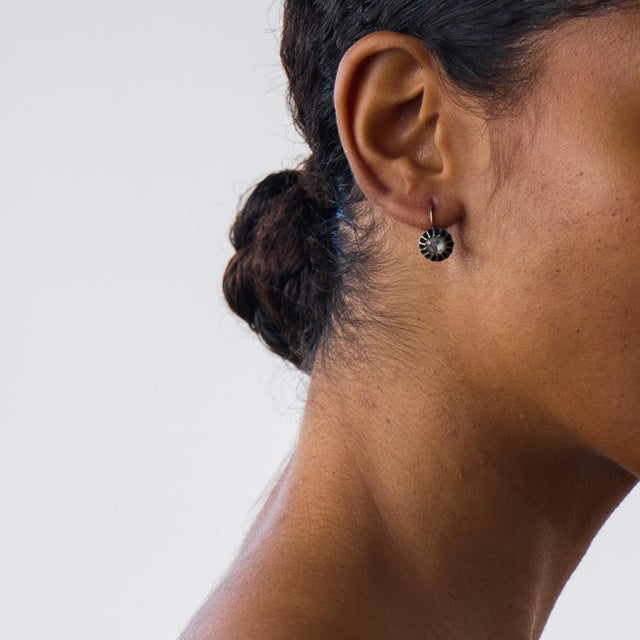 These elegant Victorian diamond drop earrings are a beautifully refined pair from the 1880’s, each centered by a rose cut...