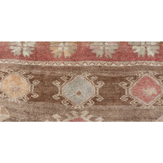 Textile Vintage Turkish Kars Tribal Rug in Earthy Tones With Reds For Sale - Image 7 of 11