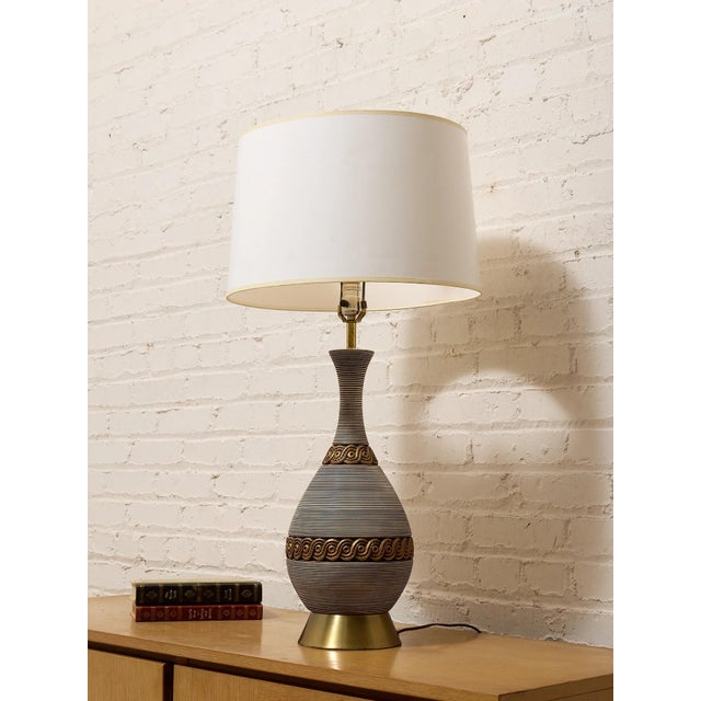 This stunning piece will add a touch of sophistication to any room in your home. The lamp will provide a warm and cozy...