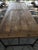 Extra long vintage solid elm wood table with heavy cast iron legs. Extremely heavy. Superior craftsmanship. Perfect for...
