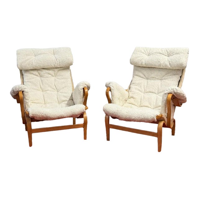 Vintage Pair of Pernilla Lounge Chairs by Bruno Mathsson for Dux in Faux Lambswool, 1970's For Sale