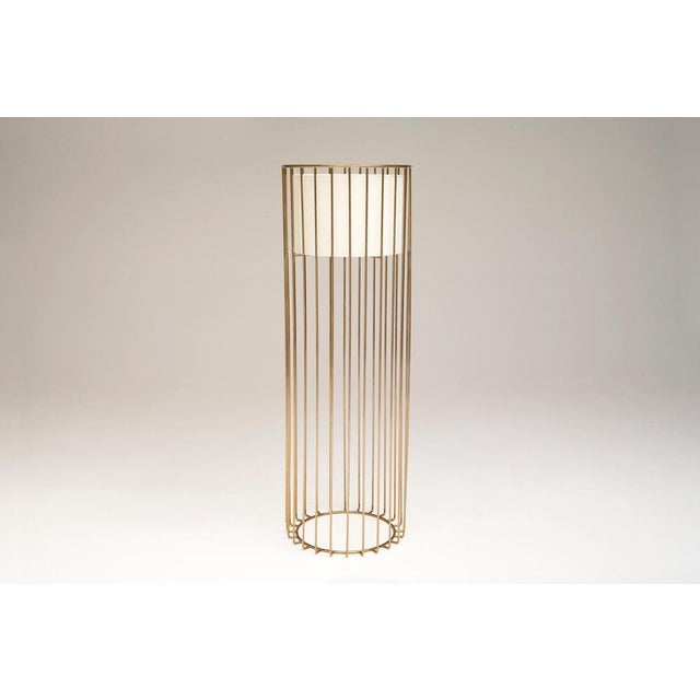 Inner Beauty Tall Floor Light by Phase Design Dimensions: Ø 61 x H 182.9 cm. Materials: Linen and smoked brass. Up to 250V...