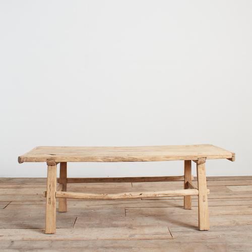 A beautiful vintage solid wooden elm coffee table with some lovely original patina. The weathered plank table top has...
