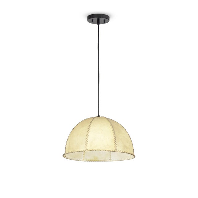 The Stevie Vellum Pendant brings natural texture and a soft, diffused glow to any room. Its silhouette moves effortlessly...