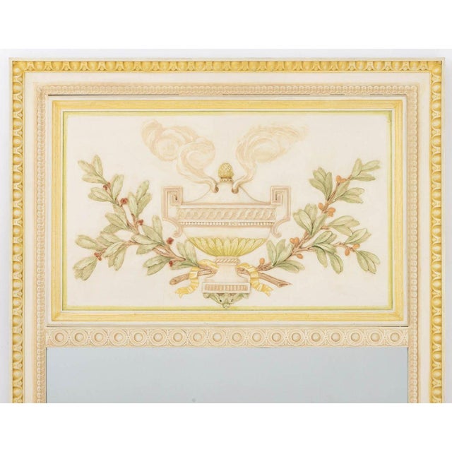 Louis XVI Style Painted and Gilt Wood Boiserie Mirror, the top panel with relief of urn and garland. Overall: 66.25" H x...