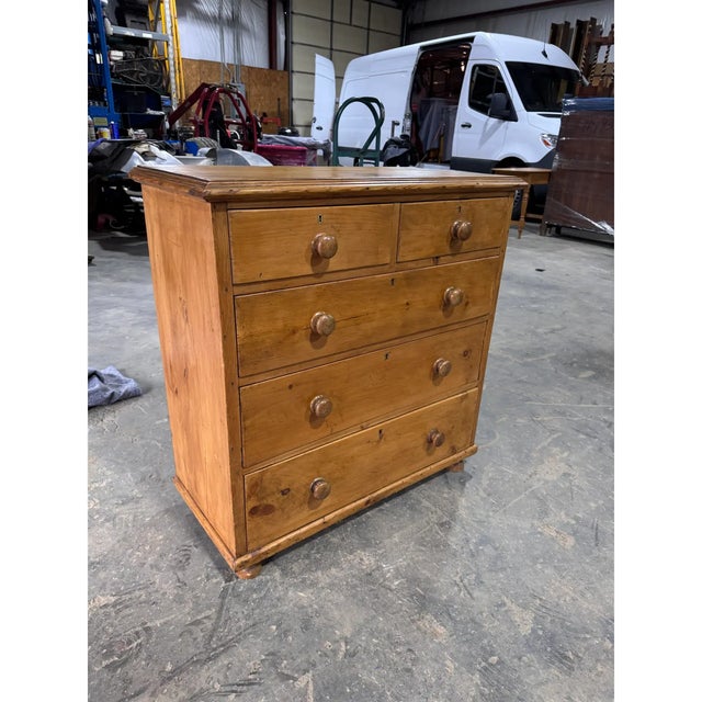 This is a lovely antique pine chest! This piece dates to the 19th century and has lovely patina. The wood has a warm glow,...